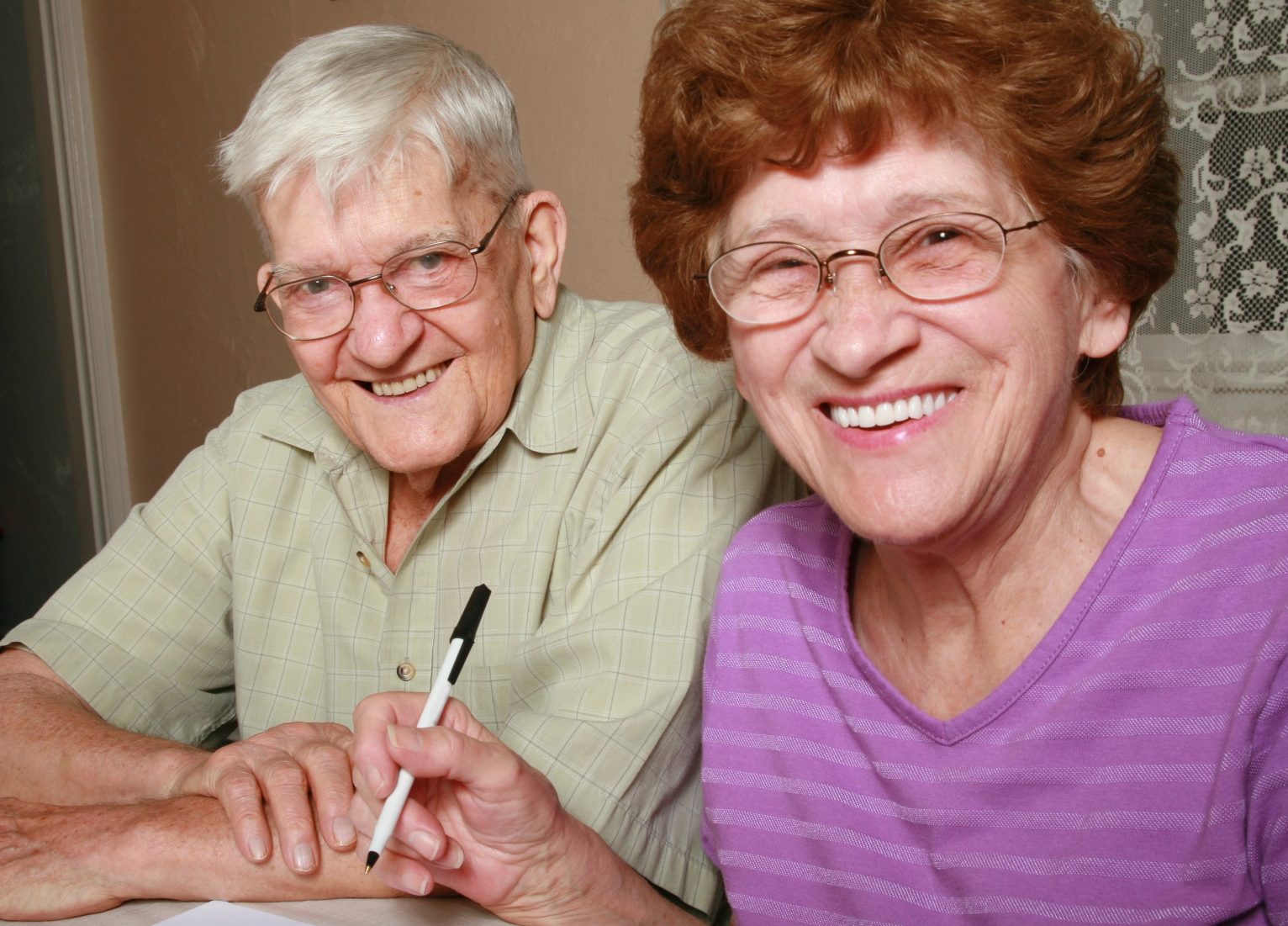 Couple filling in form