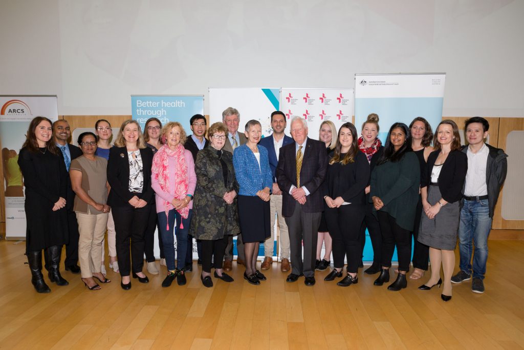 A group of ASPREE researchers and participants stand together at the ACTA Clinical Trial of the Year Award ceremony